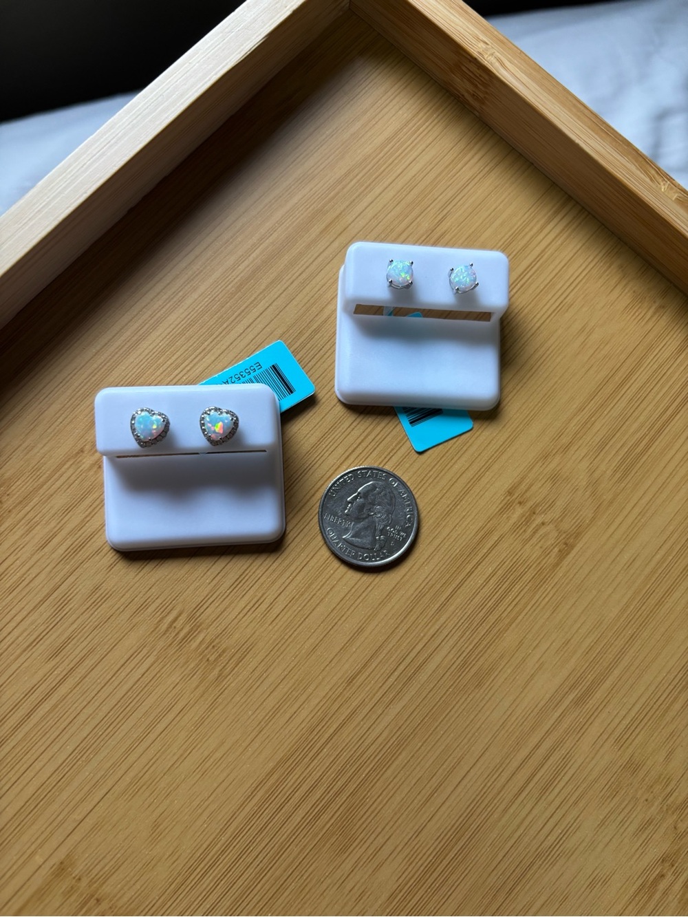 2 pairs of sterling silver opal earrings.